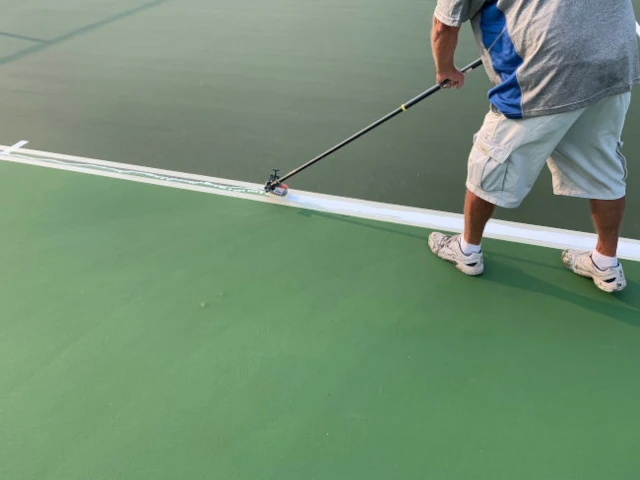 Pickleball court being resurfaced